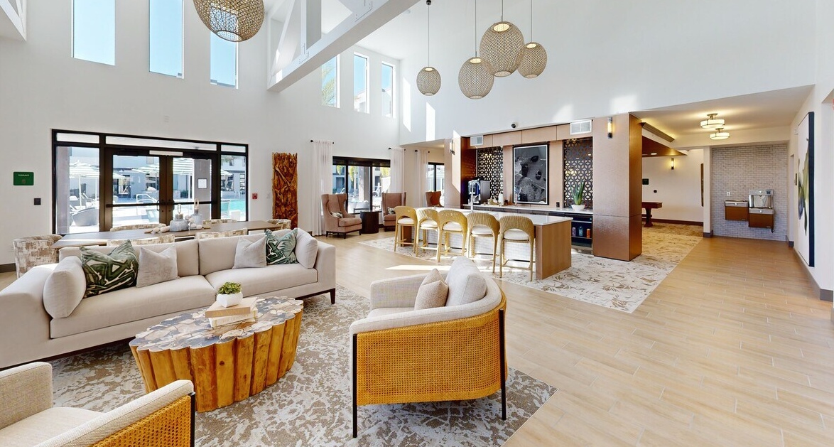 Modern apartment community with coworking space and resort-style pool in Fort Myers.