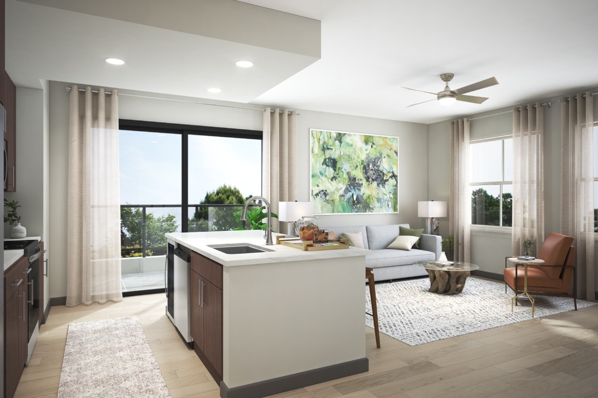Luxury apartment living room and kitchen with upscale finishes at Sinclair Fort Myers